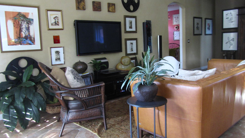 This is an example of an eclectic home theatre in Miami.