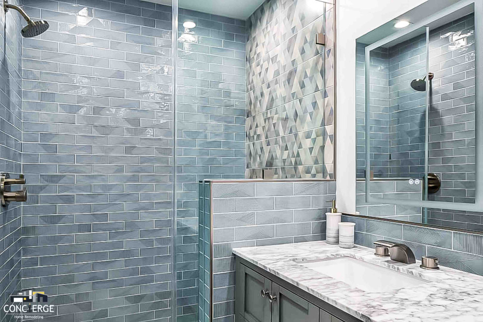 This is an example of a small contemporary 3/4 bathroom in Los Angeles with shaker cabinets, grey cabinets, an alcove shower, blue tile, cement tile, granite benchtops, a hinged shower door, grey benchtops, a single vanity and a freestanding vanity.