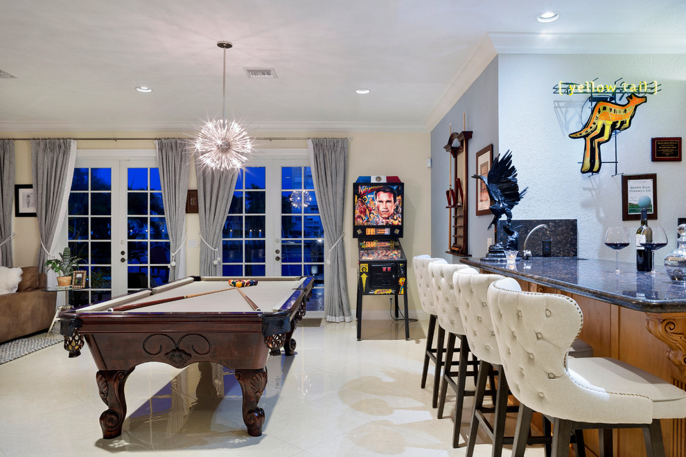 Design ideas for a large transitional open concept family room in Miami with a home bar, multi-coloured walls, marble floors, no fireplace and white floor.