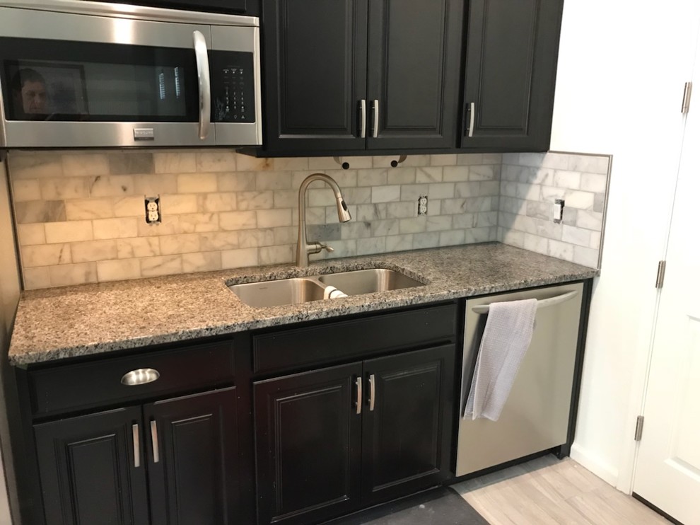Mid-sized minimalist single-wall eat-in kitchen photo in Phoenix with brown backsplash, brick backsplash, an island and white countertops