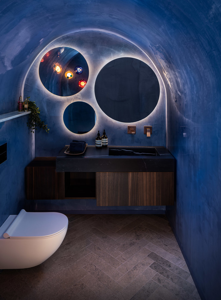 This is an example of a contemporary powder room in London.
