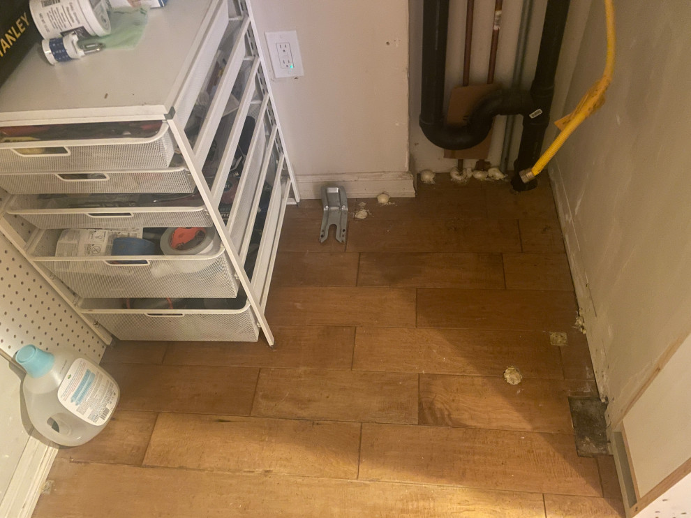 Floor damaged beneath my washer dryer