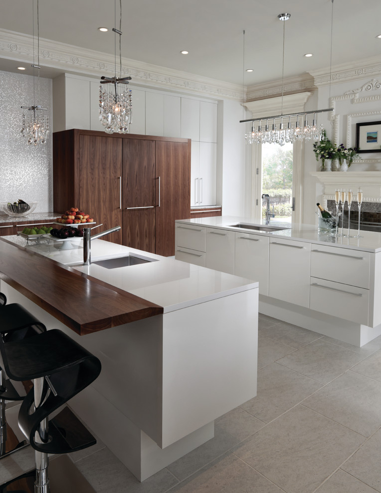 Inspiration for a large contemporary l-shaped eat-in kitchen in Houston with a single-bowl sink, flat-panel cabinets, white cabinets, quartz benchtops, white splashback, porcelain splashback, stainless steel appliances, porcelain floors, multiple islands and grey floor.