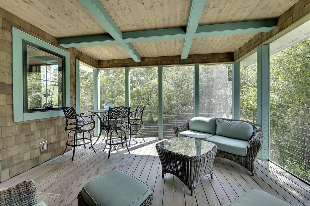 This is an example of a transitional sunroom in Minneapolis with grey floor.