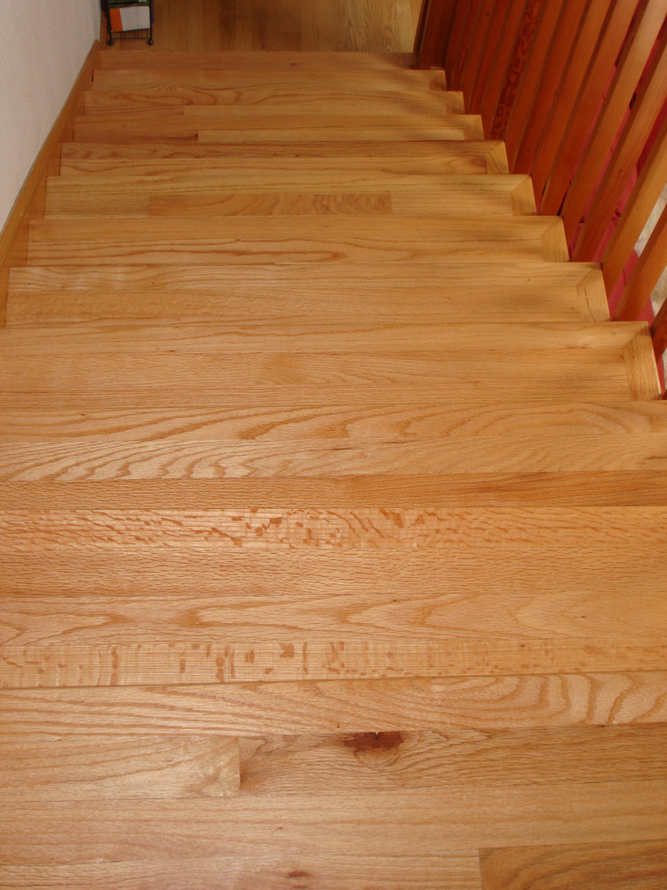 Custom Wood Stair Railing and Wood Flooring on Stairway and Hall