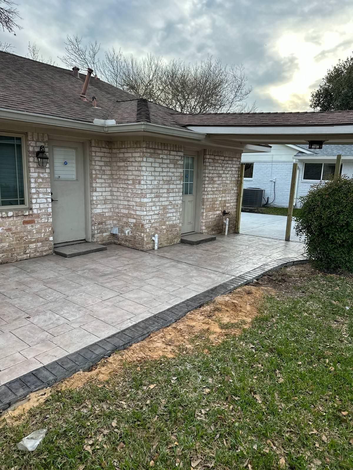 New driveway with sidewalks and stamped concrete!