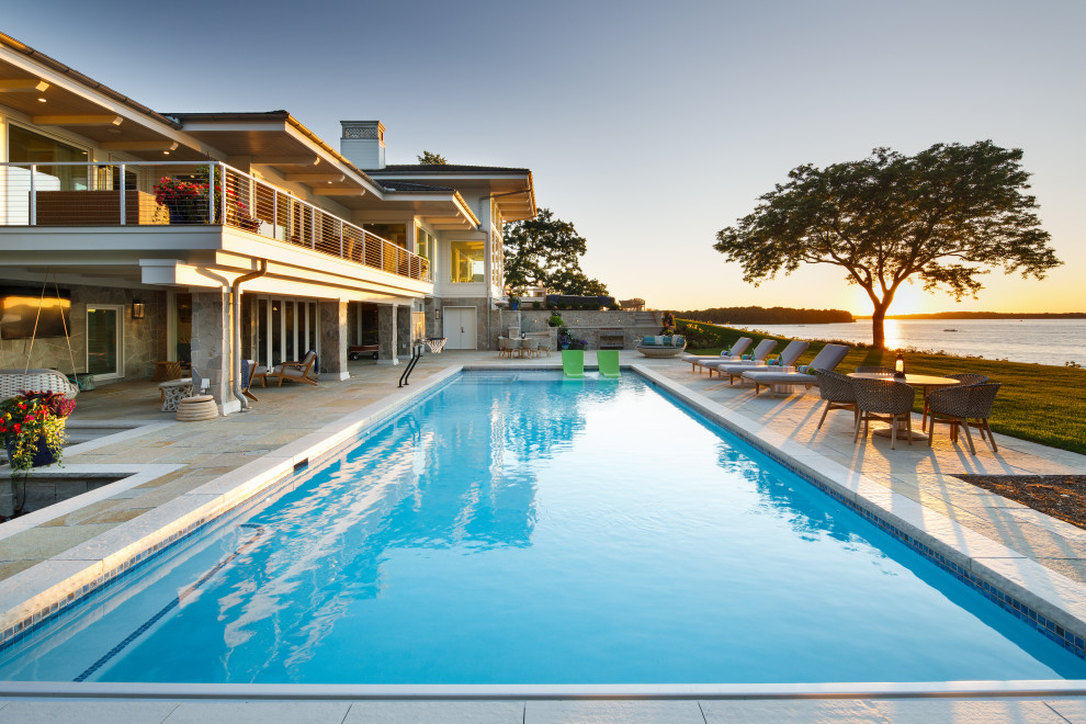 Transitional backyard rectangular pool photo in Minneapolis