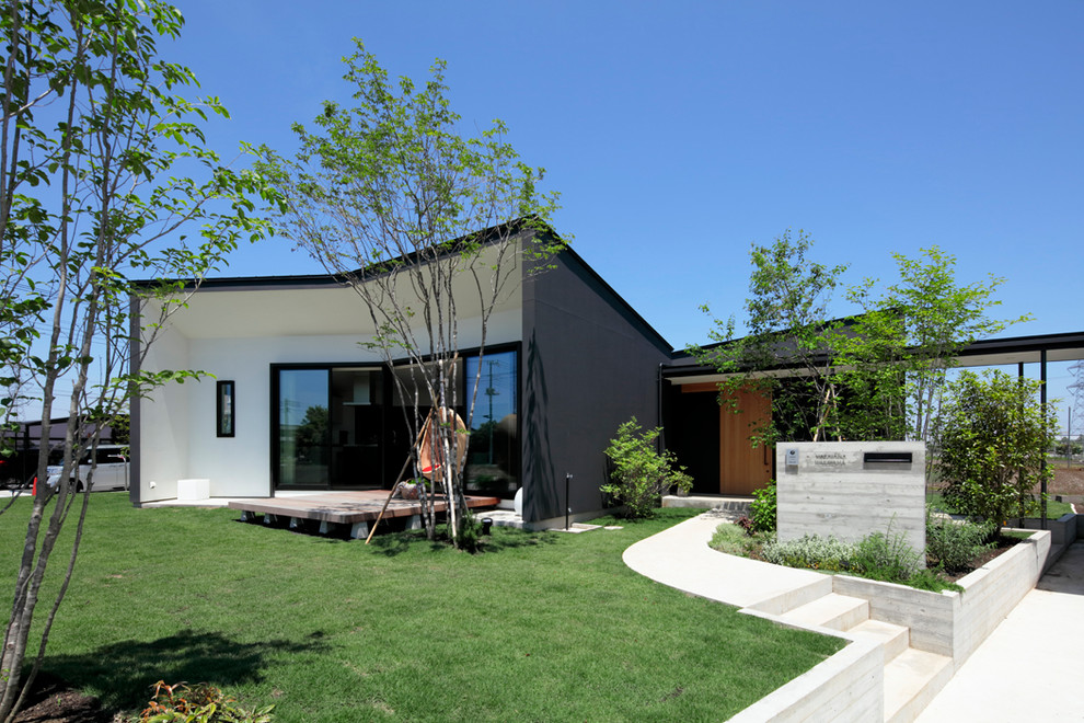 Contemporary black exterior in Other.