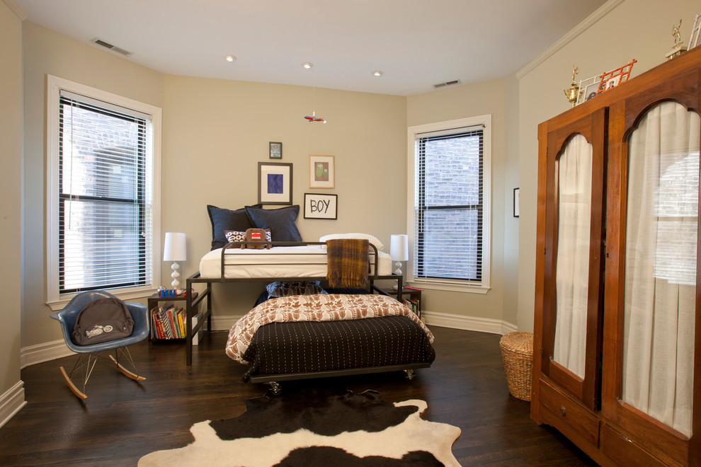 Wicker Park Renovation 1 - Bedroom transitional boy dark wood floor and brown floor kids' bedroom photo in Chicago with beige walls