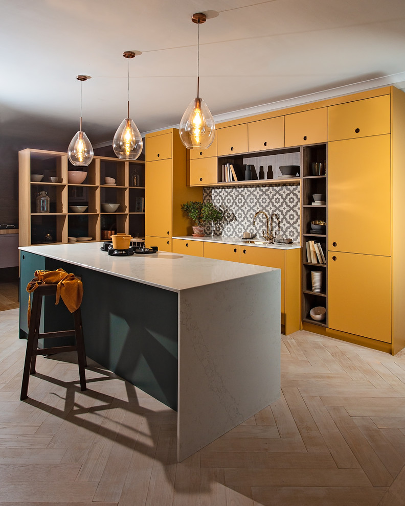 Design ideas for a large contemporary open plan kitchen in Other with a single-bowl sink, flat-panel cabinets, yellow cabinets, solid surface benchtops, grey splashback, ceramic splashback, panelled appliances, plywood floors, with island, white floor and white benchtop.