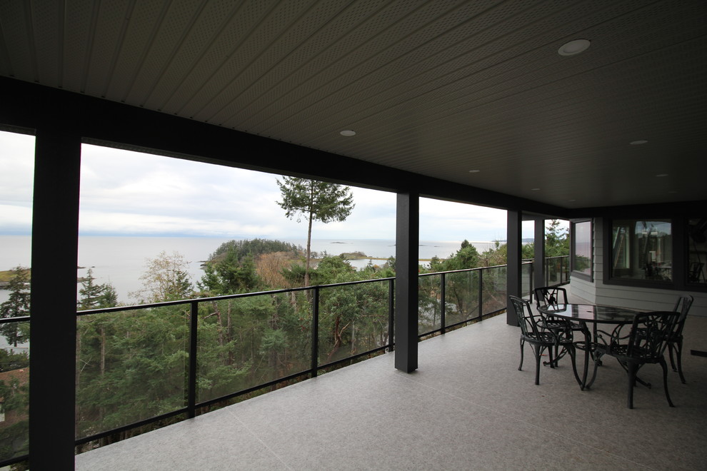 Deck - large modern backyard deck idea