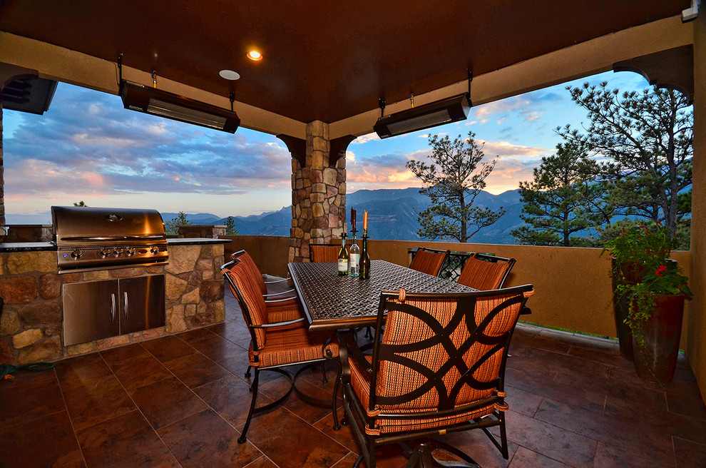 Example of a transitional home design design in Denver