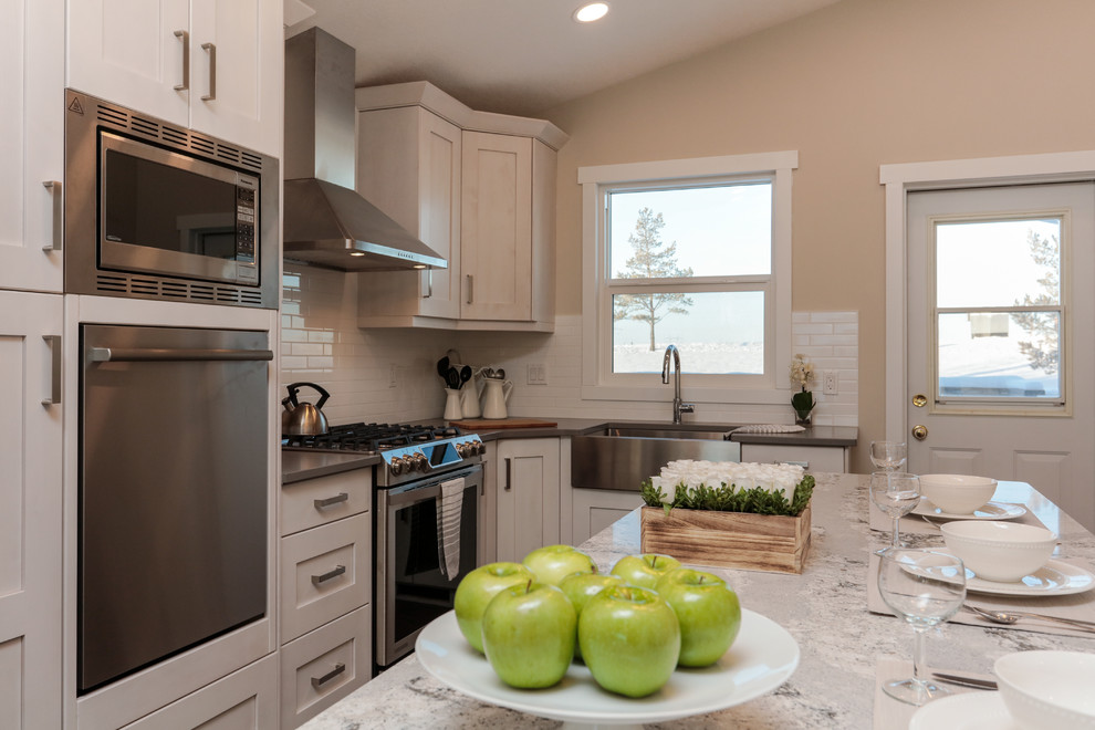 Example of a transitional kitchen design in Edmonton