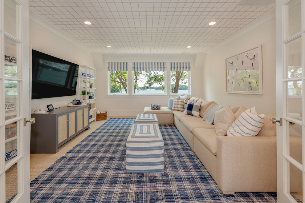 This is an example of a beach style family room in Charlotte.