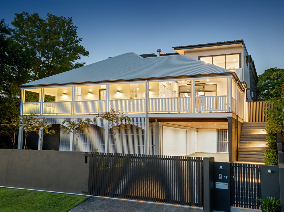 Expansive traditional three-storey house exterior in Brisbane.