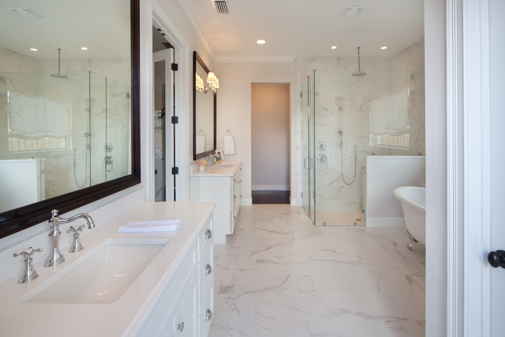 Inspiration for a transitional master bathroom in Orlando with an undermount sink, flat-panel cabinets, white cabinets, granite benchtops, a claw-foot tub, a corner shower, white tile, porcelain tile, grey walls, porcelain floors and a one-piece toilet.