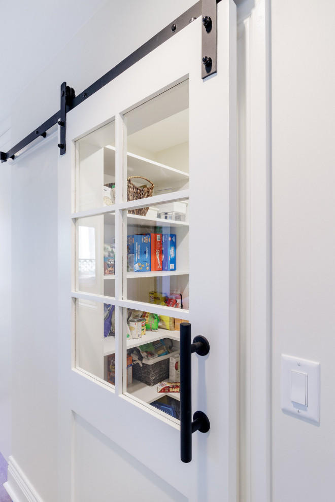 Transitional home design photo in Vancouver