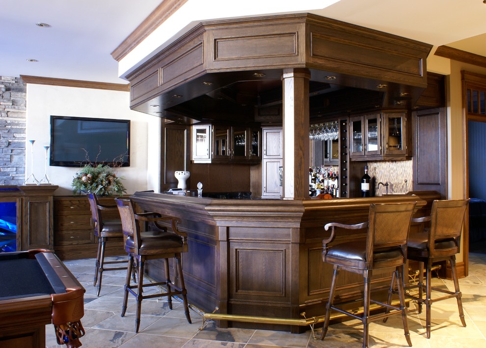 Inspiration for a traditional home bar in Burlington.