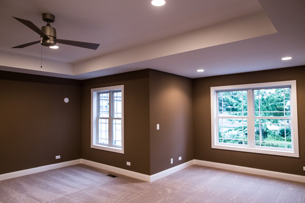 Inspiration for a mid-sized transitional master carpeted home design remodel in Chicago with brown walls and no fireplace