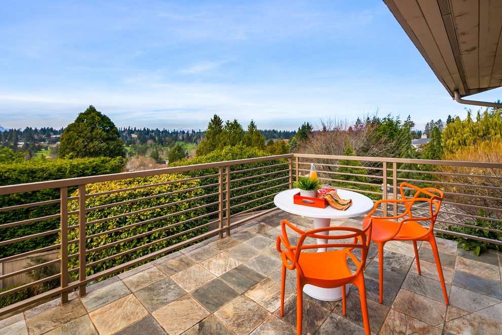 This is an example of a large retro balcony in Seattle.