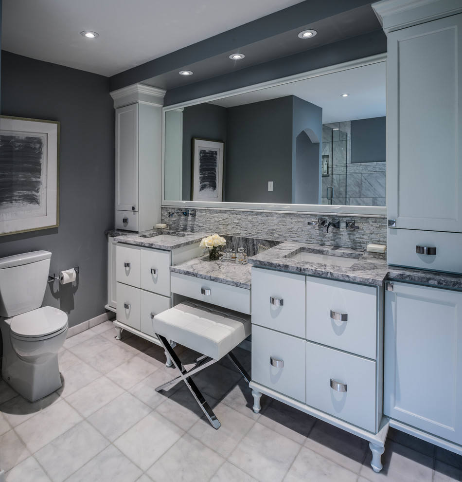 Alcove shower - large transitional master gray tile, white tile and stone tile marble floor alcove shower idea in Indianapolis with flat-panel cabinets, white cabinets, a two-piece toilet, gray walls, an undermount sink and marble countertops