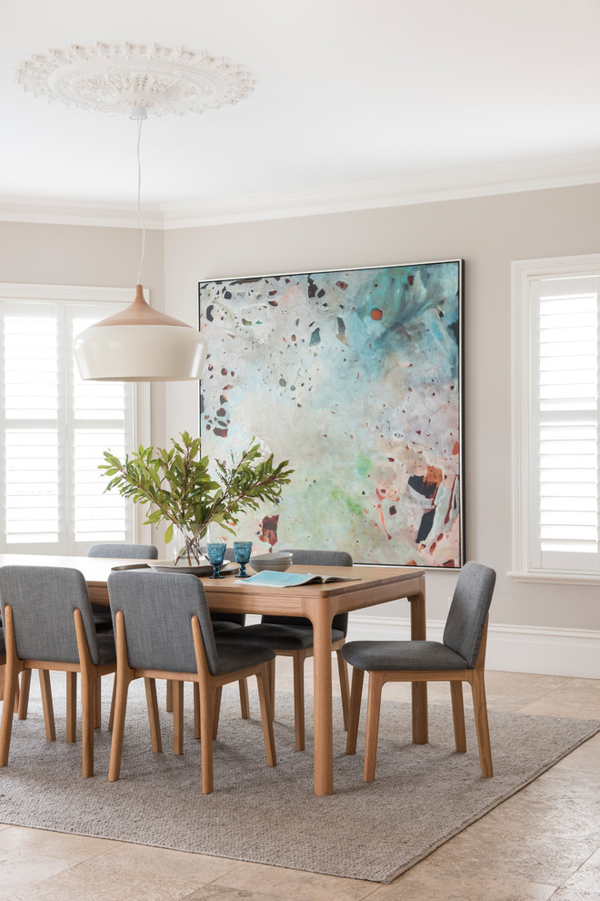 Photo of a mid-sized scandinavian dining room in Perth with beige walls.