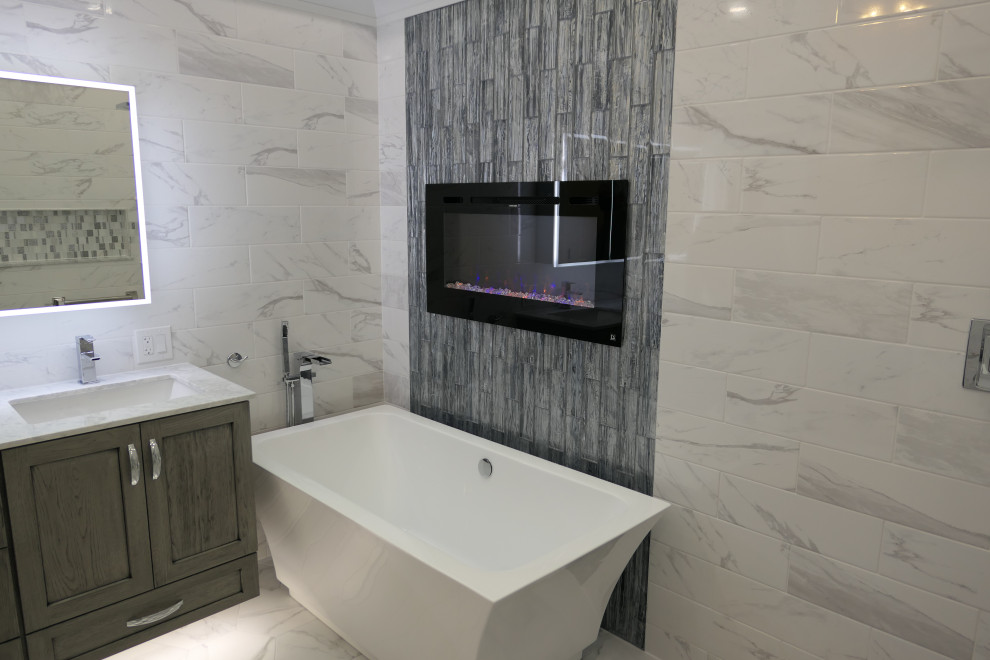 Inspiration for a modern master bathroom in Chicago with shaker cabinets, a freestanding tub, an open shower, white tile, engineered quartz benchtops, an open shower, a double vanity and a floating vanity.
