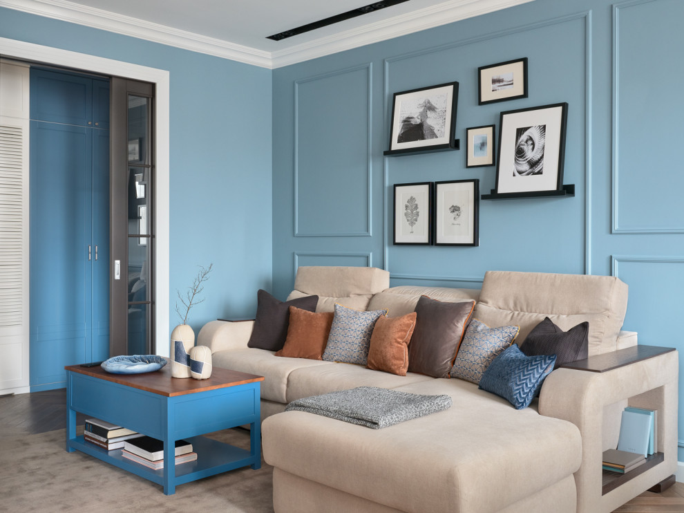 Design ideas for a mid-sized transitional enclosed living room in Moscow with blue walls, brown floor and decorative wall panelling.