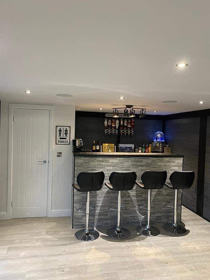 Garçonnière - home cinema et coin bar en sous-sol