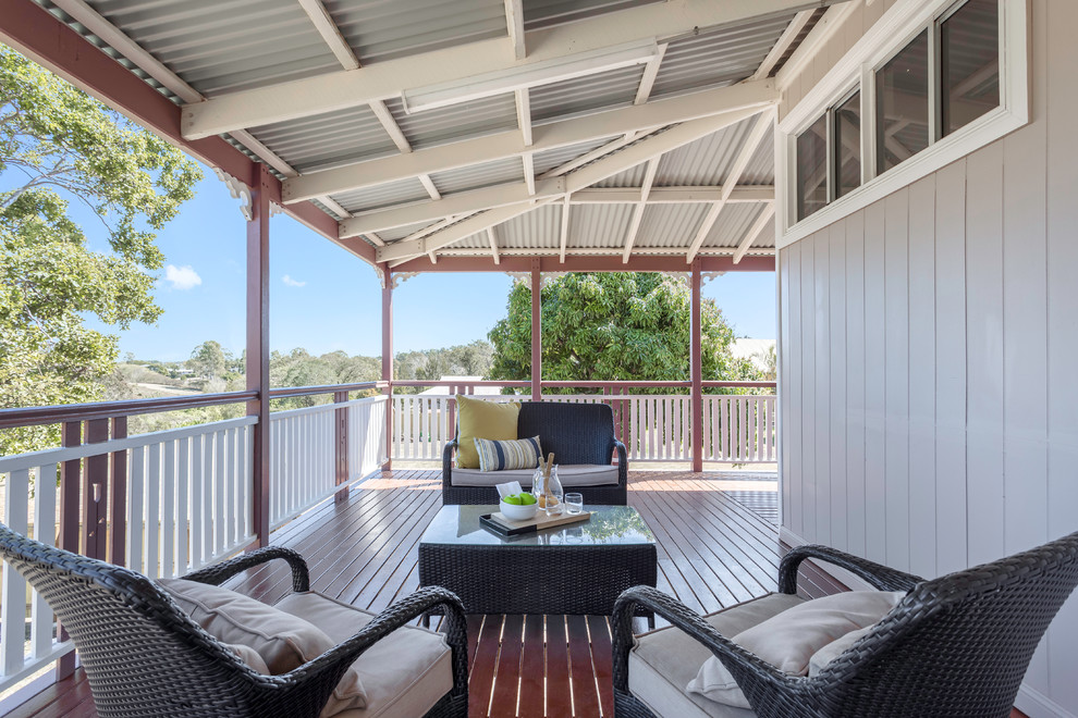 Scandinavian backyard deck in Brisbane with a roof extension.