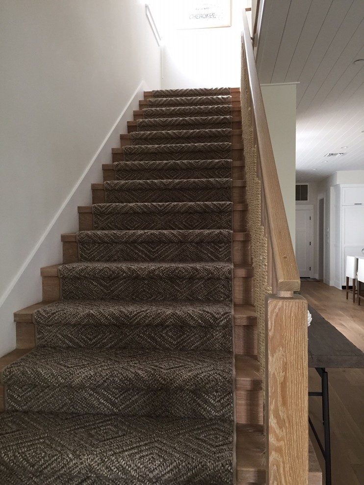 Mid-sized traditional wood straight staircase in Los Angeles with wood risers.