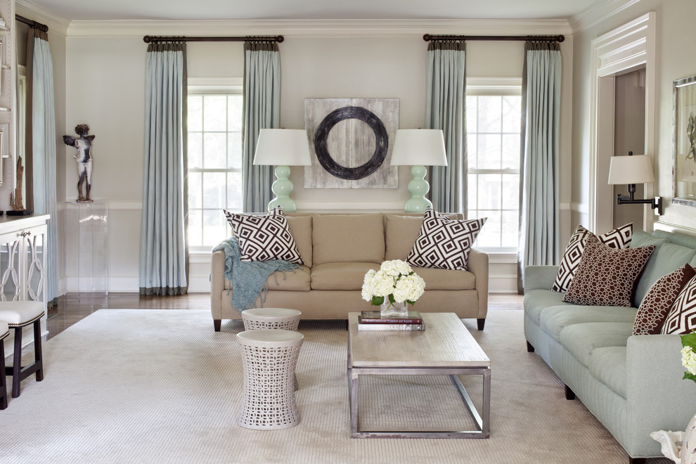 Inspiration for a mid-sized transitional open concept family room in Little Rock with beige walls and carpet.