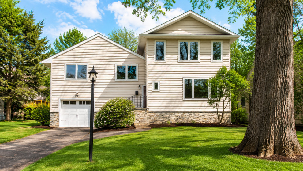 Landscaped Front Yard and Two-Story Facade