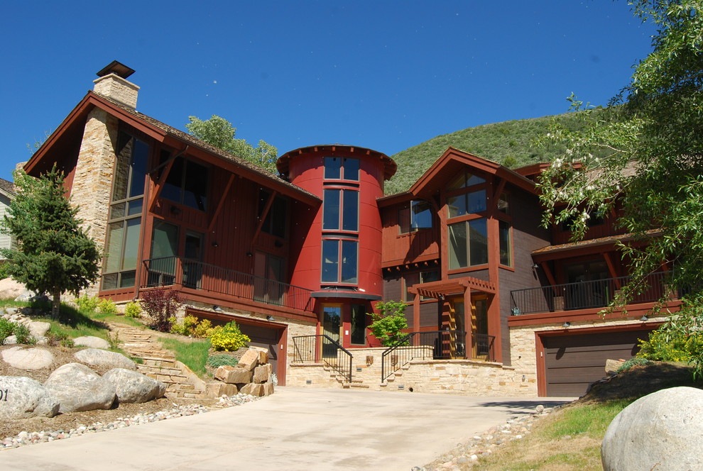 Contemporary two-storey red duplex exterior in Denver.