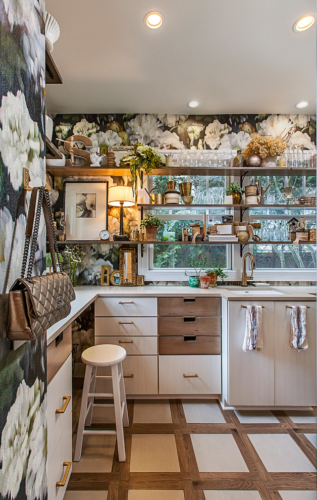 Example of a mid-sized transitional u-shaped enclosed kitchen design in Detroit with an undermount sink, flat-panel cabinets, beige cabinets, no island and beige countertops
