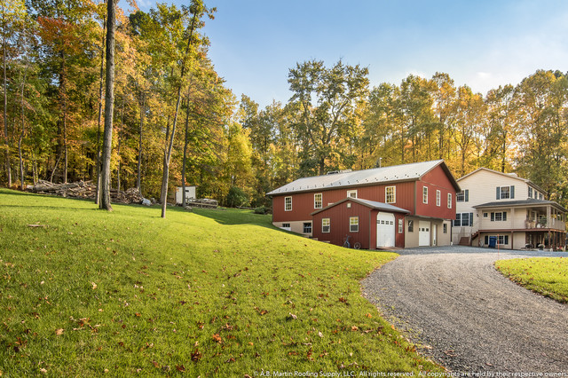 Amish Barn In Red And Bronze Metal Roofing And Siding Farmhouse