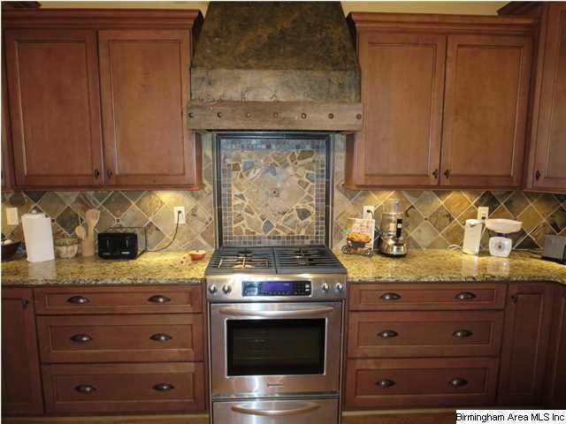 Example of a mountain style kitchen design in Birmingham