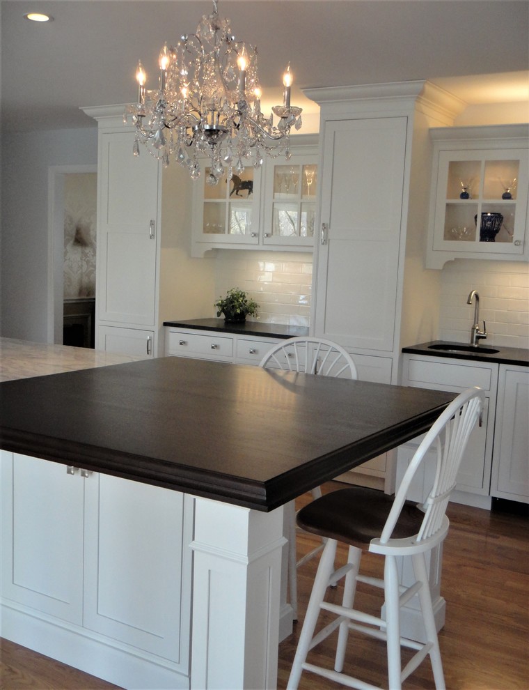Example of a transitional kitchen design in New York