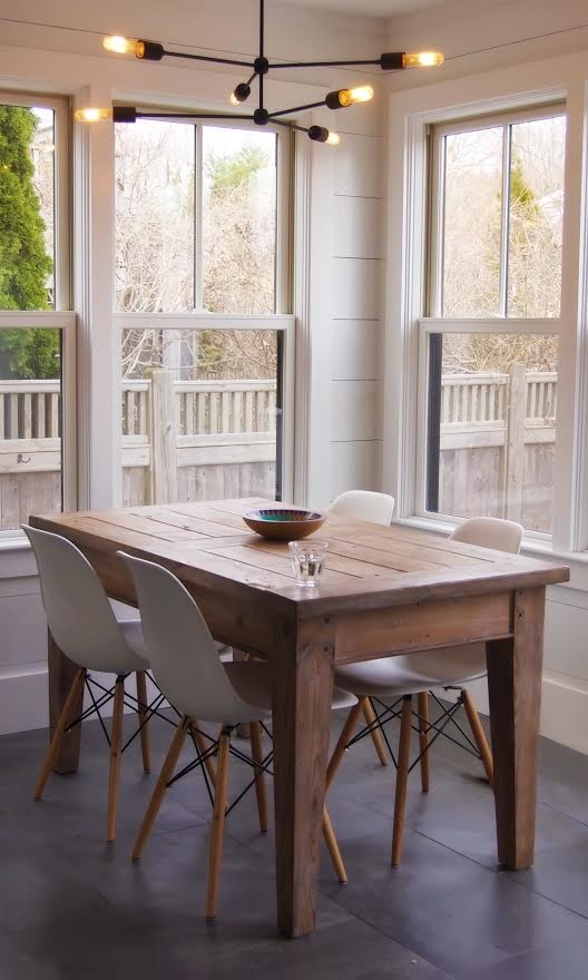 Mid-sized transitional dining room photo in Boston with white walls and no fireplace