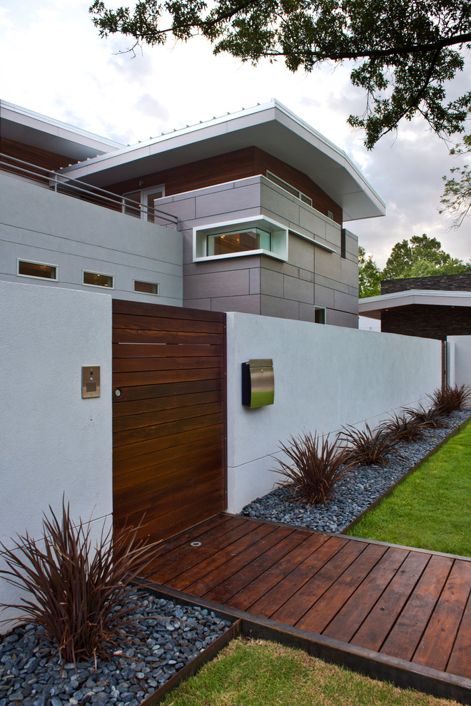 Design ideas for a contemporary two-storey exterior in Other.