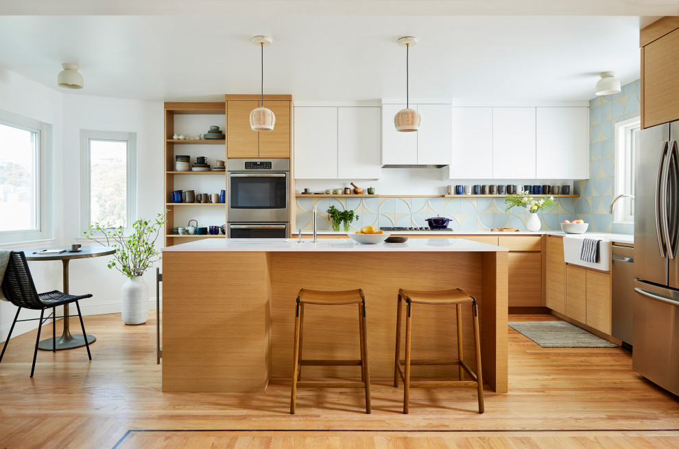 Example of a trendy kitchen design in San Francisco with an island