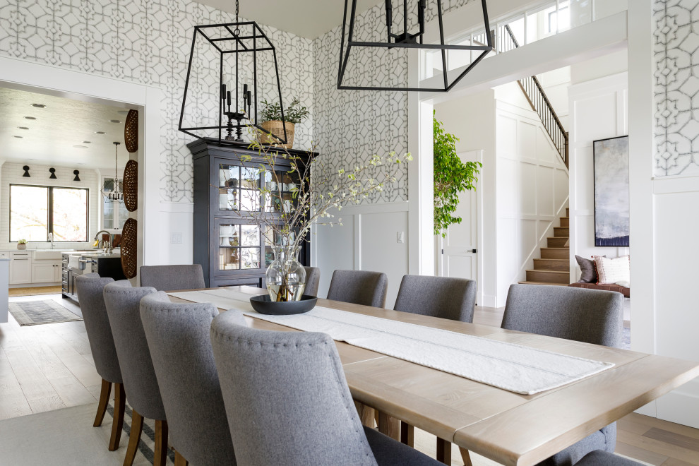 Example of a large farmhouse wallpaper dining room design in Boise