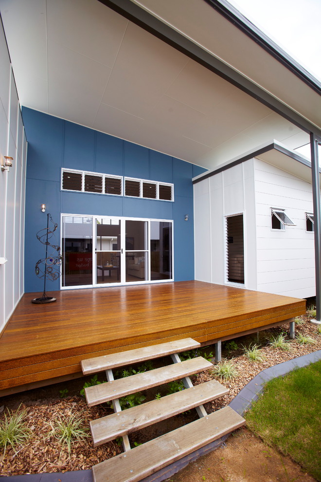 This is an example of a beach style deck in Brisbane with decking.
