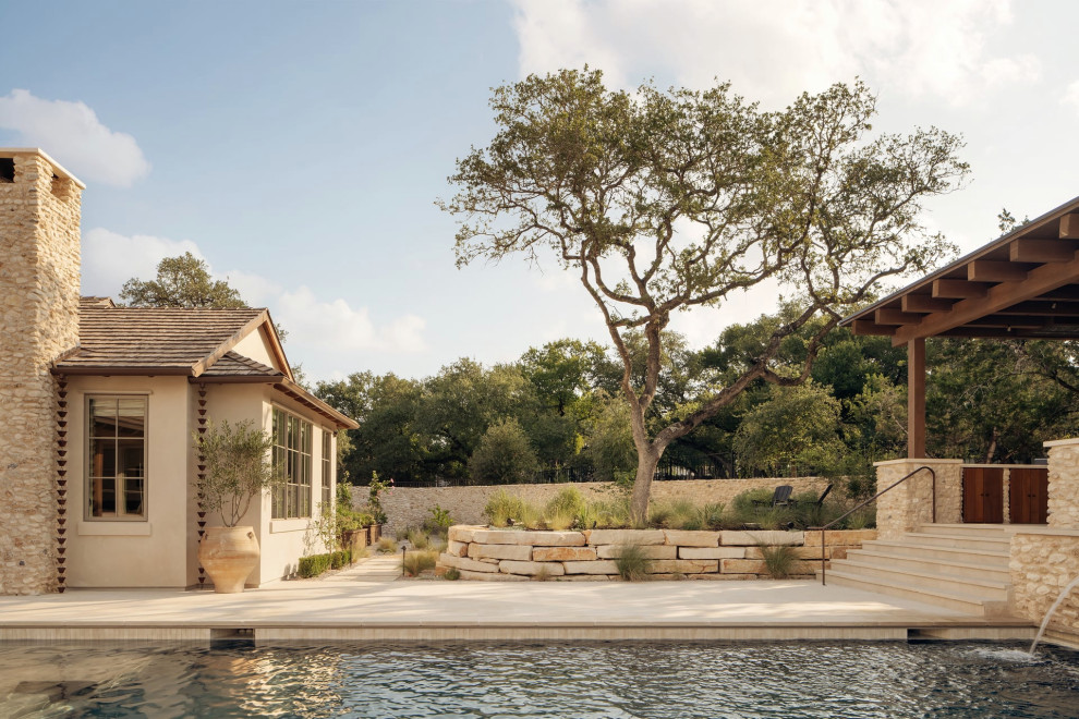 Transitional pool photo in Austin