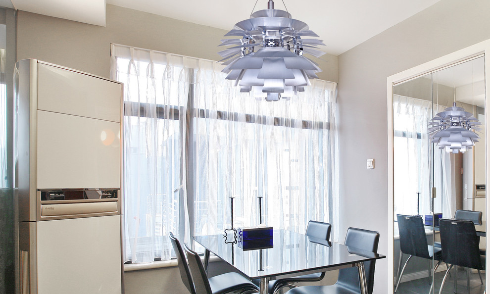 This is an example of a modern dining room in Sydney.
