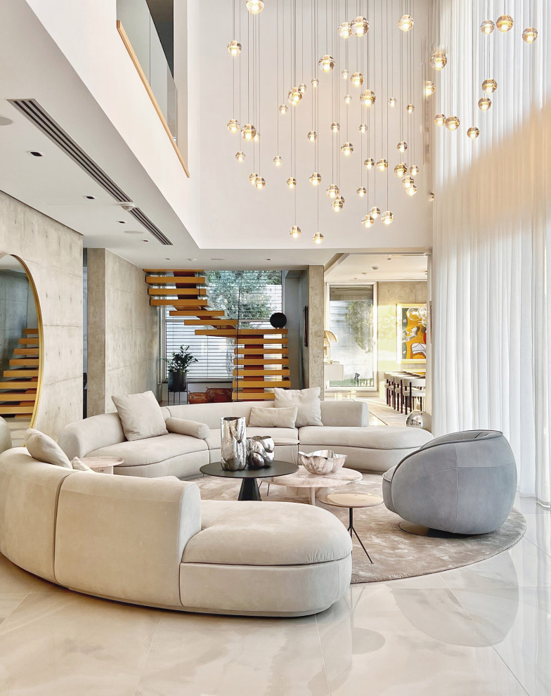 Foto di un ampio soggiorno minimal aperto con pavimento in marmo, nessuna TV e pavimento beige