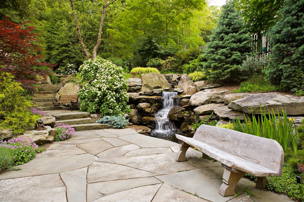 Photo of a traditional garden in Newark with a water feature.
