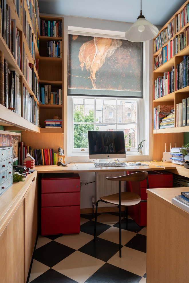 Design ideas for a medium sized traditional home office in London.