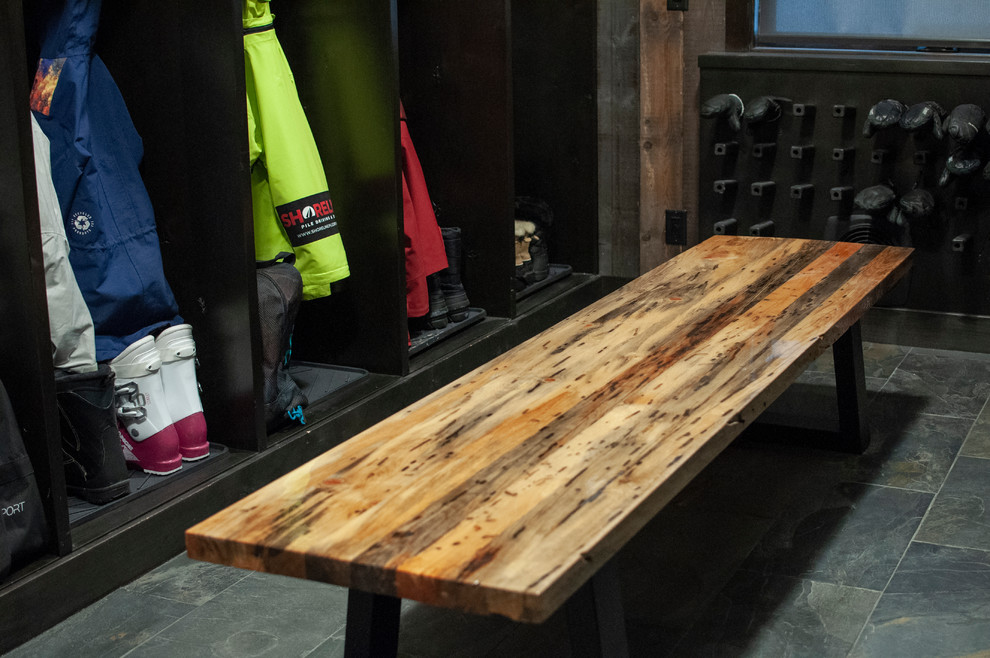 Inspiration for a large rustic slate floor and multicolored floor mudroom remodel with beige walls