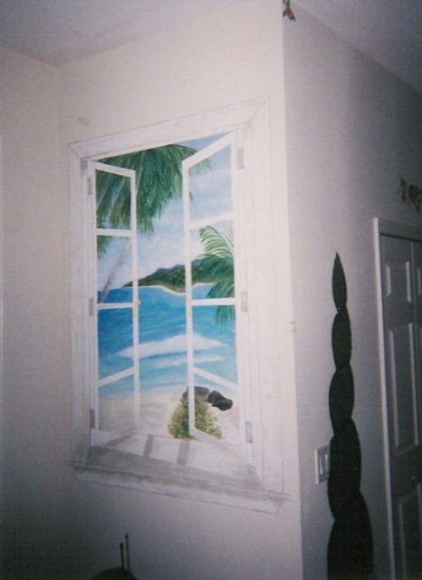 This is an example of a tropical bedroom in Phoenix.